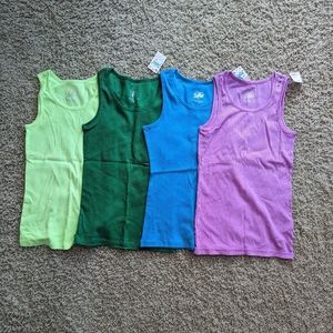 NWT: Group of four Justice tank tops
